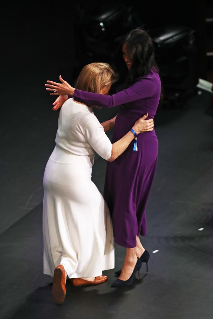 Duchess Meghan greeted Kate Robertson, the founder of One Young World with a hug rather than a traditional curtsy.