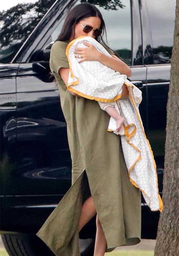 In July, Meghan was snapped attending a polo match, in which Prince Harry was competing. The 38-year-old's très chic [olive caftan dress](https://www.nowtolove.com.au/fashion/fashion-news/meghan-markle-kate-middleton-polo-dresses-56978|target="_blank") by Lisa Marie Fernandez was the first thing on our spring wardrobe wish-list.