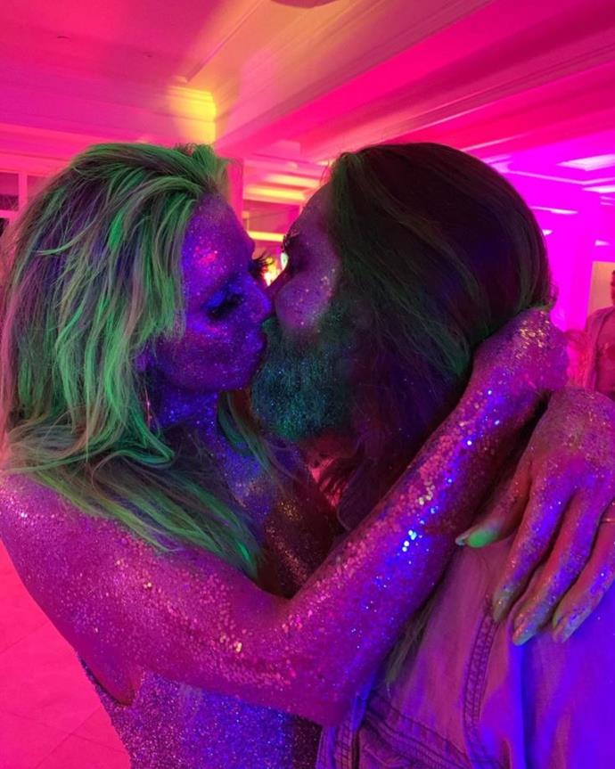 Former supermodel Heidi Klum is well-known for her epic Halloween costumes but this first one of herself and husband Tom Kaulitz decked out in glitter is quite simple for her.
