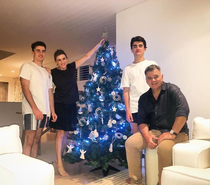 *The Morning Show*'s Kylie Gillies shared this sweet snap of herself, husband Tony and teenage sons Gus and Archie around their Christmas tree.