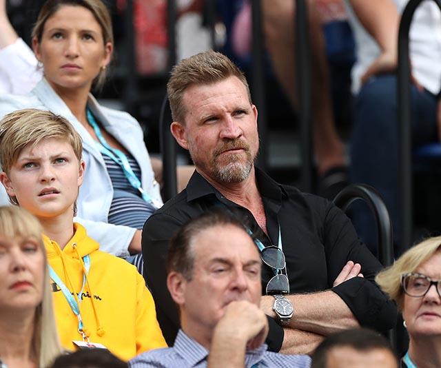 Aussie Rules icon Nathan Buckley contemplated the game intently during a whirlwind match between Nick Kyrgios and Rafael Nadal.