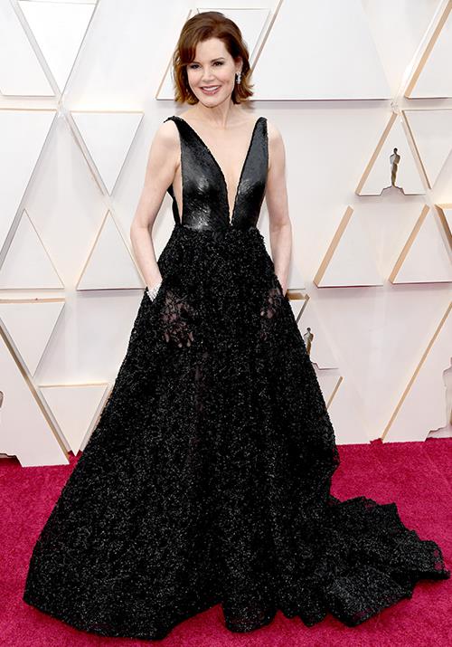 Um, wow. Geena Davis is an absolute vision in black - the plunging neckline and sheer pocked detailing screams glamour and we're here for it.