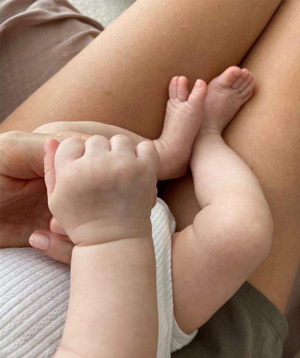 Look at those gorgeous little arms and legs! And how sweet is Frankie clutching onto her Mum's finger?