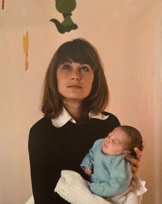 A young Carole Middleton holds baby Catherine.