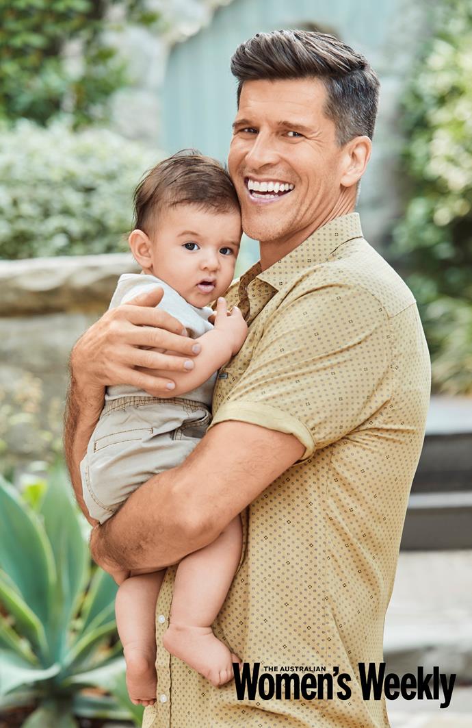 Osher and his adorable son Wolfie posing on set at our exclusive photoshoot.