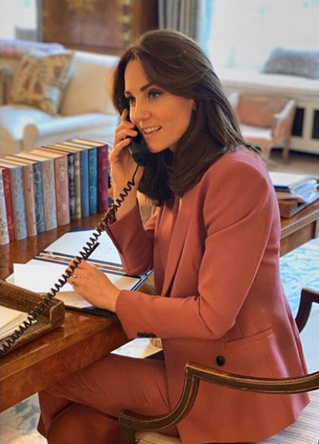 In one of the two new images, Kate is seen at her Kensington Palace home speaking to Place2Be CEO Catherine Roche.