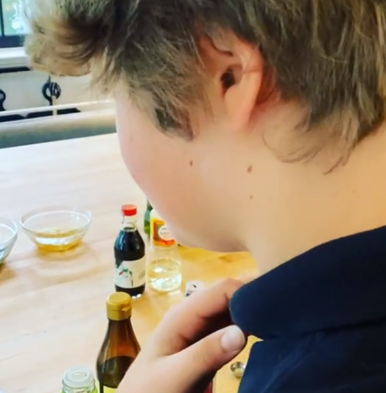 Gwyneth films son Moses whipping up some tasty looking dipping sauces.