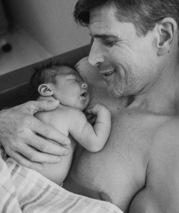 *The Bachelor* host took to fatherhood like a duck to water, and shared this beautiful image of him getting skin to skin contact with Wolfie 90 minutes after the birth.