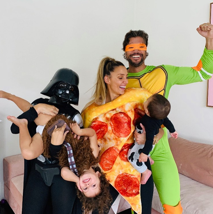 The family all get in on Sam's workout sessions - especially when there's a dress-up theme!