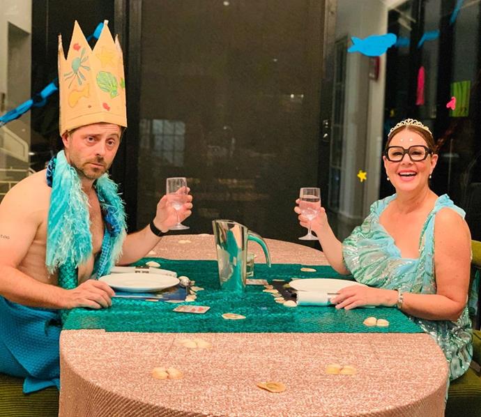 *I'm A Celeb* host **Julia Morris** and her husband haven't let lockdown stop them from enjoying fun date nights at home. They dress up in hilarious costumes and decorate the house according to a particular theme. This picture was taken during Under The Sea theme night. Cute!