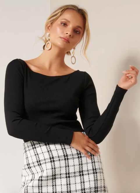 If you're keen to recreate, this boat neck style from Forever New will do the trick! $49.99, [buy it online here](https://www.forevernew.com.au/ruth-boat-neck-rib-skivvy-top-262978?colour=black|target="_blank"|rel="nofollow"). 