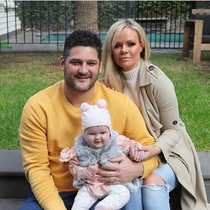 The proud parents with their youngest daughter, just a few months after her arrival in 2018.