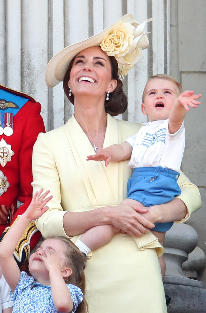 True to tradition, Kate wore a yellow Alexander McQueen frock to the event in 2019, a look that almost (emphasis on *almost*) stole the show over Prince Louis' adorable balcony debut.