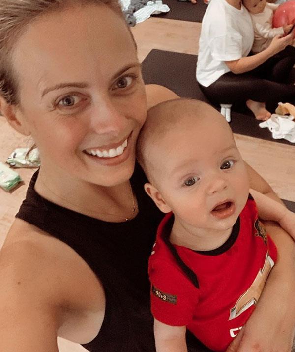 Bring your baby to barre! The mother-son duo take a breather after a mums and bubs barre class.