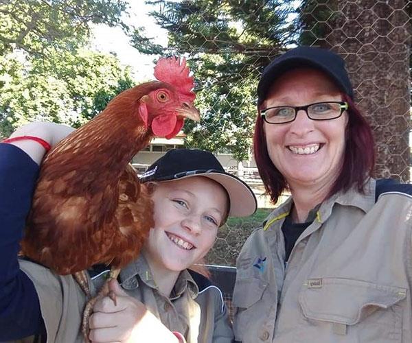 Me and mum with Ralph the rooster.