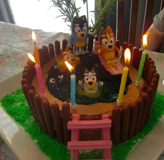 "My baby turned five today. 😍❤️What better way to celebrate than with a modified version of the #womensweeklybirthdaycakebook Swimming Pool cake - but with the Heeler family! Bingo has floaties made of lolly snakes heads (!), Chilli has a lilo made of musk sticks held together with white icing, and they all have sunscreen on their nose," @crimsongardenia penned.