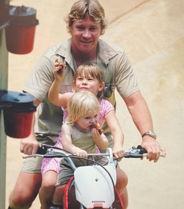 **Bob Irwin** <br><br> 
Baby Bob riding a motorcycle while eating cake and riding around Australia Zoo with his dad Steve is exactly the kind of throwback we'd expect from this iconic family.