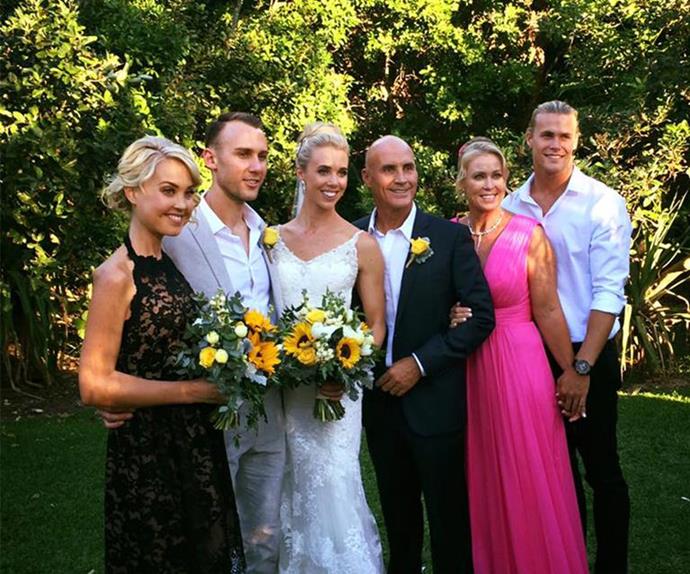 Jaimi (far left), with brother-in-law Ryan Gruell, sister Morgan, father Grant, mother Lisa and brother Jett on Ryan and Morgan's wedding day.