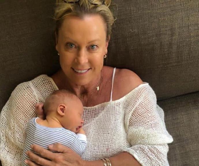 Happiness after heartbreak: Lisa with her new grandson Taj.