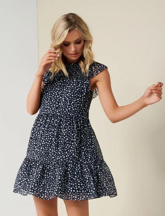 Forever New shirred smock dress, $129.99. **[Buy it online here](https://www.forevernew.com.au/rikki-shirred-smock-dress-266609?colour=navy-shadowed-ditsy|target="_blank"|rel="nofollow").** 