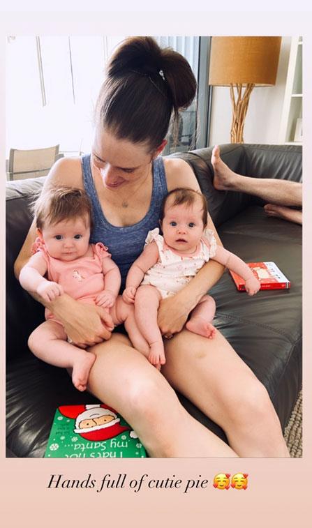 "Hands full of cutie pies," Dana mused next to this sweet snap of her growing girls at four months old.