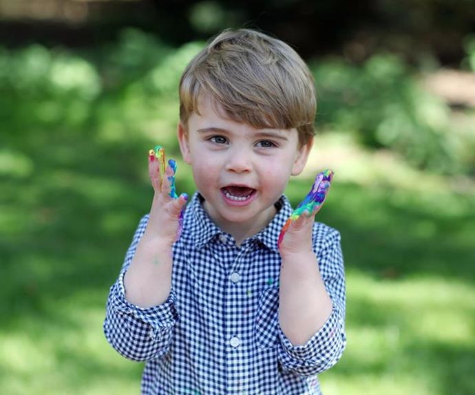 For Louis' second birthday, mum Kate snapped her young son getting creative with rainbow paint.