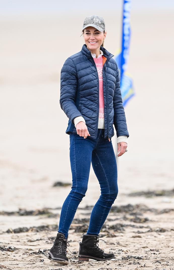 But wait, there was more! She actually started day three in *another* glorious country-Kate worthy outfit. The Duchess wore a pink jumper over a pie-crust collared shirt. Her trust skinny jeans and lace up boots were also a winner.