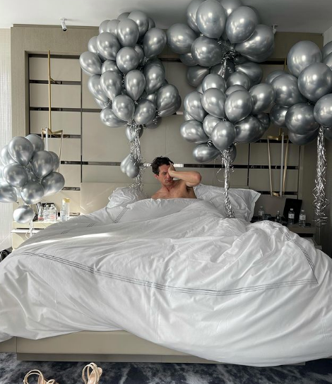 And two can play at that game - in 2021, Bec surprised Andy with a 40th birthday to remember... or not to remember? Sharing a balloon-clad hotel room the morning after the big night before, she wrote: "Surprise parties hit differently when you're 40!"