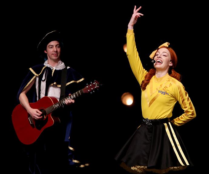 Emma and Oliver met behind the scenes of *The Wiggles*; Emma is the Yellow Wiggle and Oliver is a backup musician. According to Emma, they knew each other for four years before Oliver finally asked her out on a dinner date and romance blossomed.