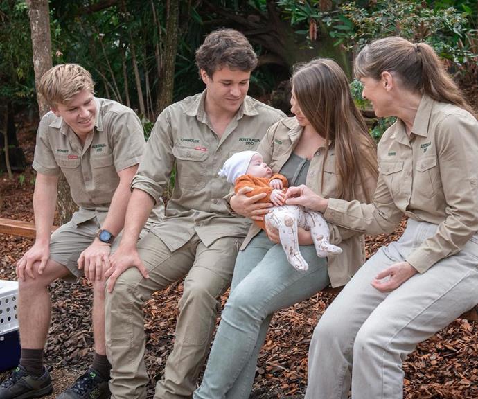 This sweet Irwin family snap was shared to mark the opening of Grace's Bird Garden at Australia Zoo, named for Bindi and Chandler's baby girl. In it, the couple cradle their daughter while Terri and Robert Irwin look on beaming.