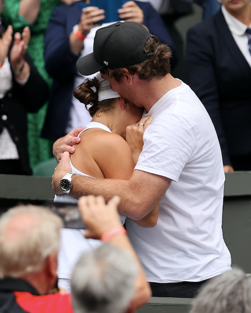 Ash embraced Garry moments after her big Wimbledon win this month.