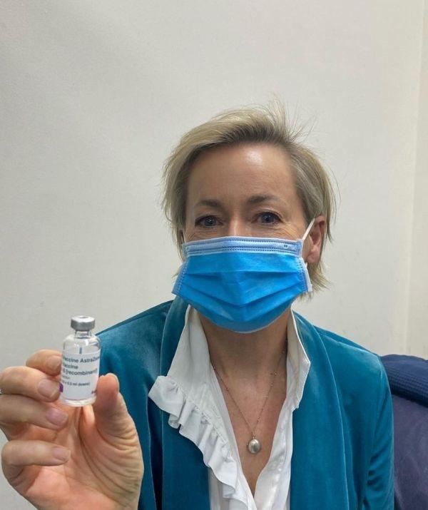 **Amanda Keller**
<br><br>
The Living Room's Amanda Keller shared a picture of herself in a clinic holding a vaccine vial to announce she is fully vaccinated. 
<br><br>
She wrote, "Double dosed!!!!! Feeling relieved and grateful."