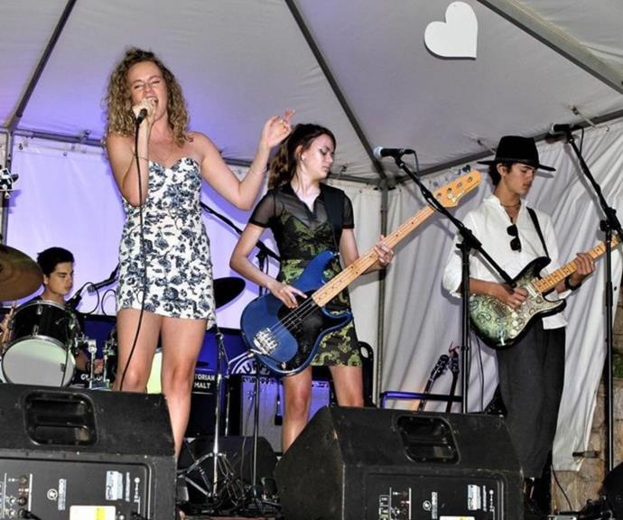 Sofia performing with her band.