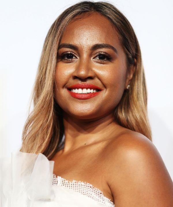 Jessica has made a bold red lip more interesting by opting for one with an orange tone, which is perfect for garden parties and picnics because of its summery feel.