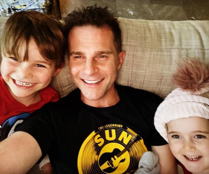 "They wanted to snuggle in the rain 🌧 #twins #billyandbetty," wrote David alongside this cute snap.