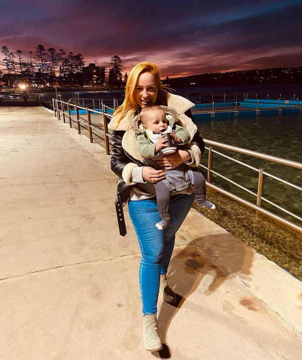 All rugged up and ready to see the world! Ollie takes an evening stroll along the Dee Why promenade with mum.