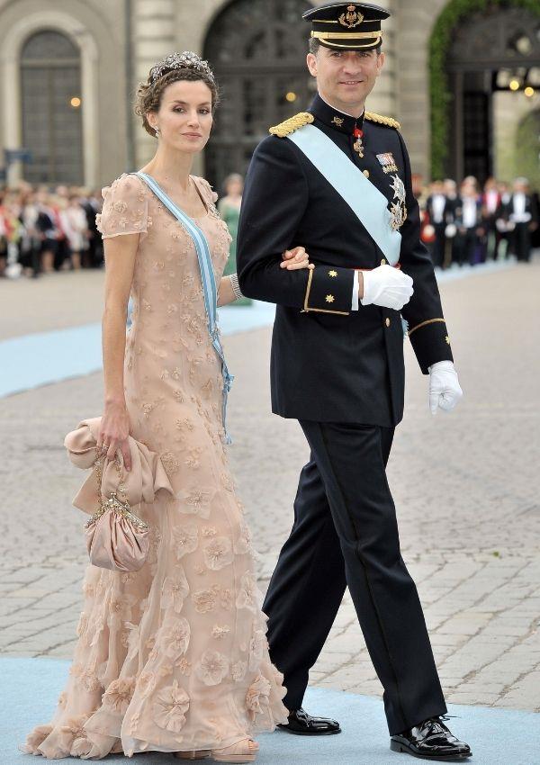 Queen Letizia stunned in this dusty nude gown for the 2010 wedding of Crown Princess Victoria of Sweden and Daniel Westling.