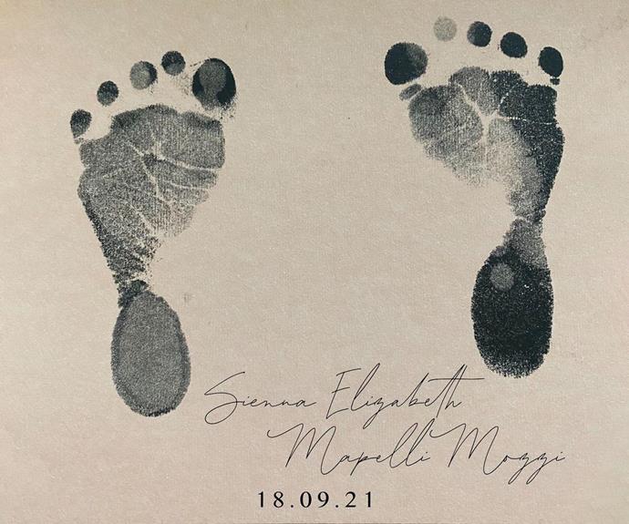 The couple shared this sweet photo of their daughter's footprints and name.