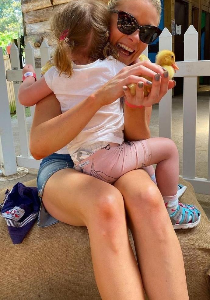 Eliza seemed keener on hugging her mumma than the baby duck.
