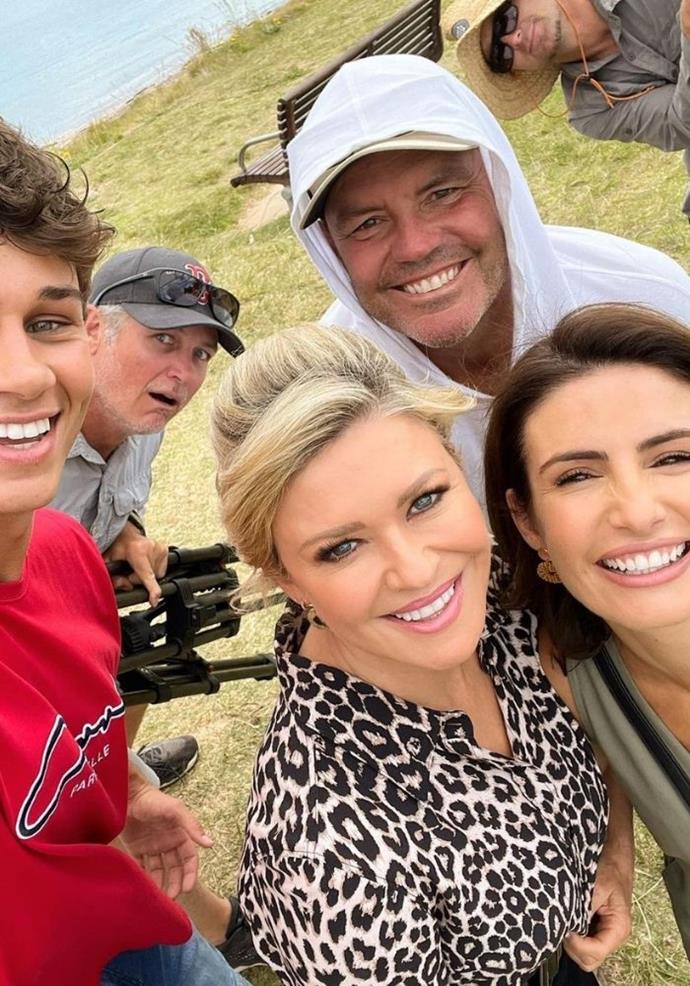 The gang is back! Ada Nicodemou posted this selfie with Emily Symons, Matt Evans, and the *Home and Away* crew to celebrate being back on location after Sydney's lockdown.
<br><br>
Ada captioned the joyful picture, "Back with the gang on location @homeandaway."