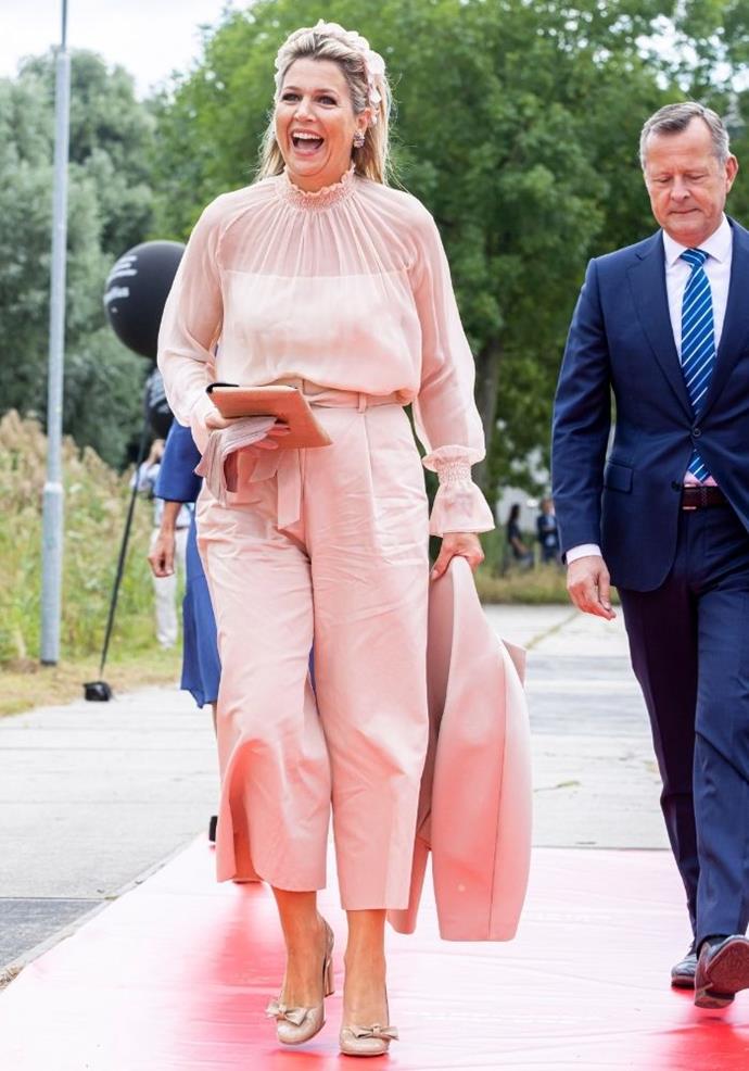 Queen Maxima of the Netherlands styled this monochromatic pink look for the opening of the National Superfast computer.