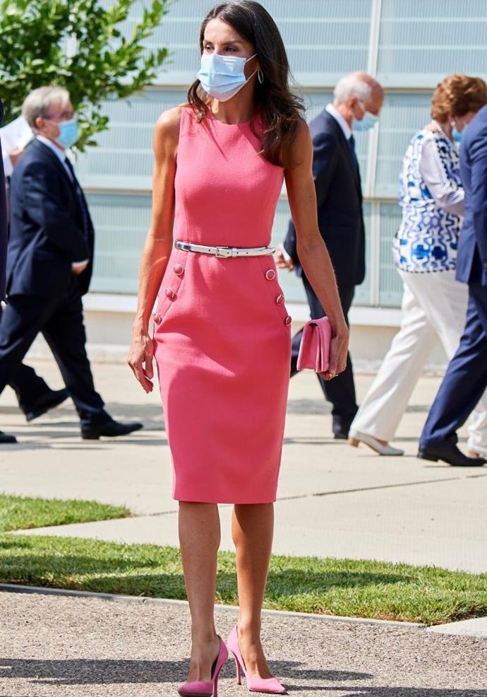 To attend the 125th anniversary of the *El Heraldo De Aragon* newspaper, Letizia opted for a watermelon pink dress and pink musk accessories.