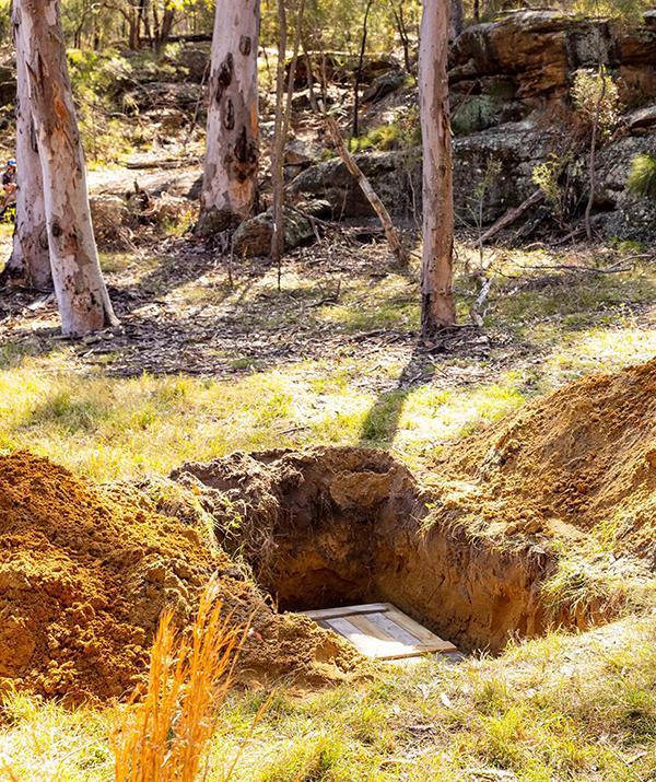 In remote bushland near Summer Bay, an empty coffin sits open. But who is it meant for?