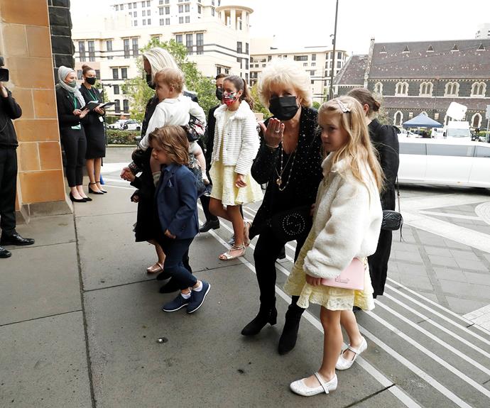 Patti put on a brave face as she headed into the cathedral holding hands with one of her beloved granddaughters.