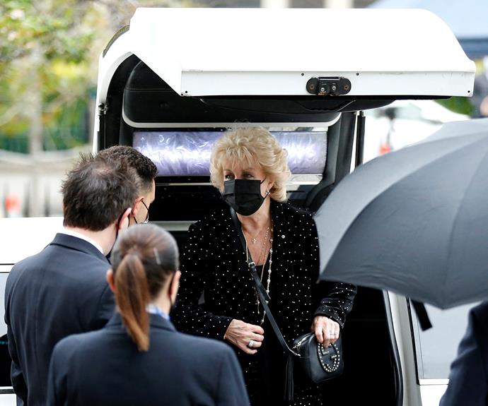 Patti wore a black face mask to the service.