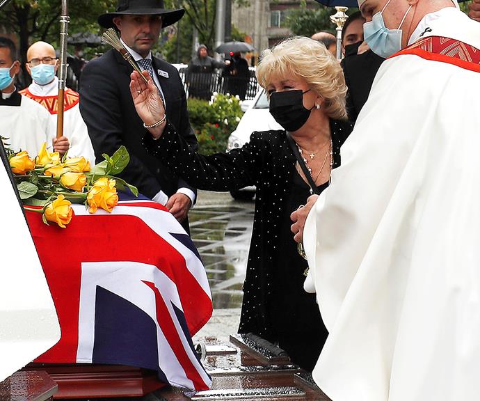 Patti broke down in tears after the service as Bert's casket was taken away.
