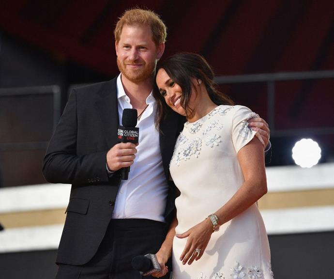 Harry couldn't stop himself from embracing Meghan at the 2021 Global Citizen Live Festival in Central Park, and they glowed as they basked in their love on stage.