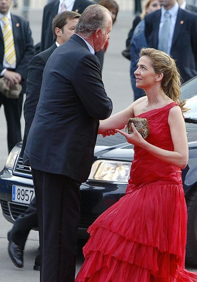 Princess Cristina of Spain kept her purse firmly in her hands as she curtseyed for her father, King Juan Carlos.