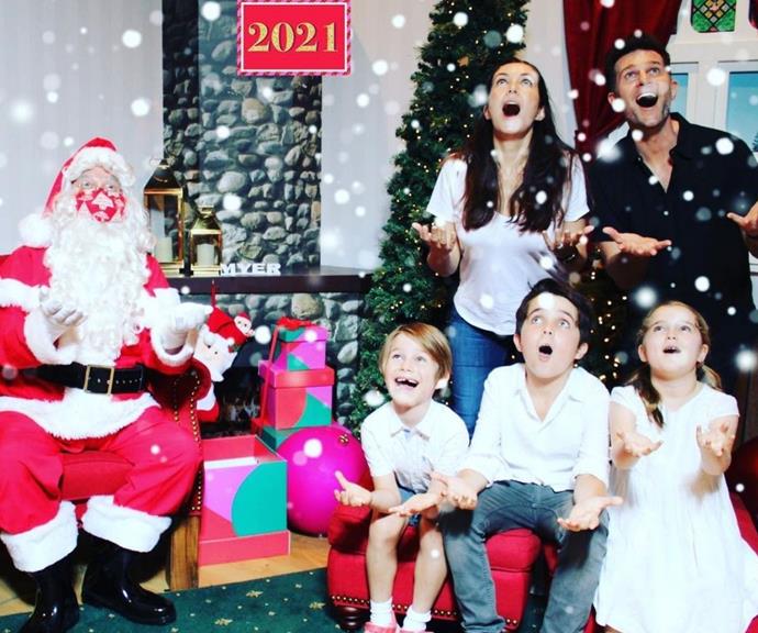 **David Campbell** 
<br><br>
The Campbell family take Christmas very seriously, just as they do with their epic [Halloweens](https://www.nowtolove.com.au/celebrity/celeb-news/celebrity-halloween-costumes-2021-69652|target="_blank"), and for 2021 they have aced it with a big tree, matching pyjamas, Santa hats, and all the decorations you could want.  
<br><br>
Along with his wife Lisa and their three children Betty, Billy, and Leo, the *Today Extra* host visited Santa for some high energy pictures, and the glee on the family's faces says it all! 
<br><br>
"Santaland is here, and it's awesome," David wrote on Instagram. "The kids loved the train ride and getting to meet 🎅🏼 to tell him how good they have been this year. How great are the photos?! So fun. It's officially 🎄 time #unriddlechristmas #billyandbetty #leo #myerchristmas."