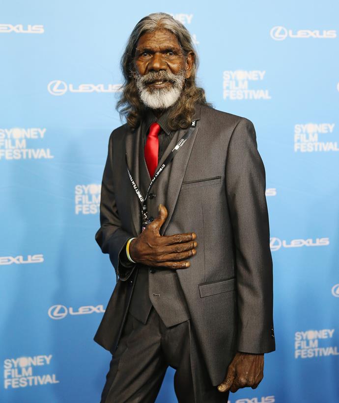 **David Gulpilil**
<br><br>
Yolŋu performer and artist [David Gulpilil Ridjimiraril Dalaithngu passed away from lung cancer](https://www.nowtolove.com.au/celebrity/celeb-news/celebrity-tributes-david-gulpilil-ridjimiraril-dalaithngu-death-70151|target="_blank") in November, aged 68. The icon who starred in films like *Crocodile Dundee, Storm Boy, Rabbit-Proof Fence*, and *Australia* has left an incredible mark on the world.
<br><br>
Hugh Jackman, who had the privilege of working with David, remembered him in a solemn message, "I join all Australians, and the world over, in mourning the loss of David Gulpilil Ridjimiraril Dalaithngu... His contribution to film is immeasurable. From his cheeky laugh, to that mischievous glint in his eye and effortless ease in front of the camera … His humanity is irreplaceable."